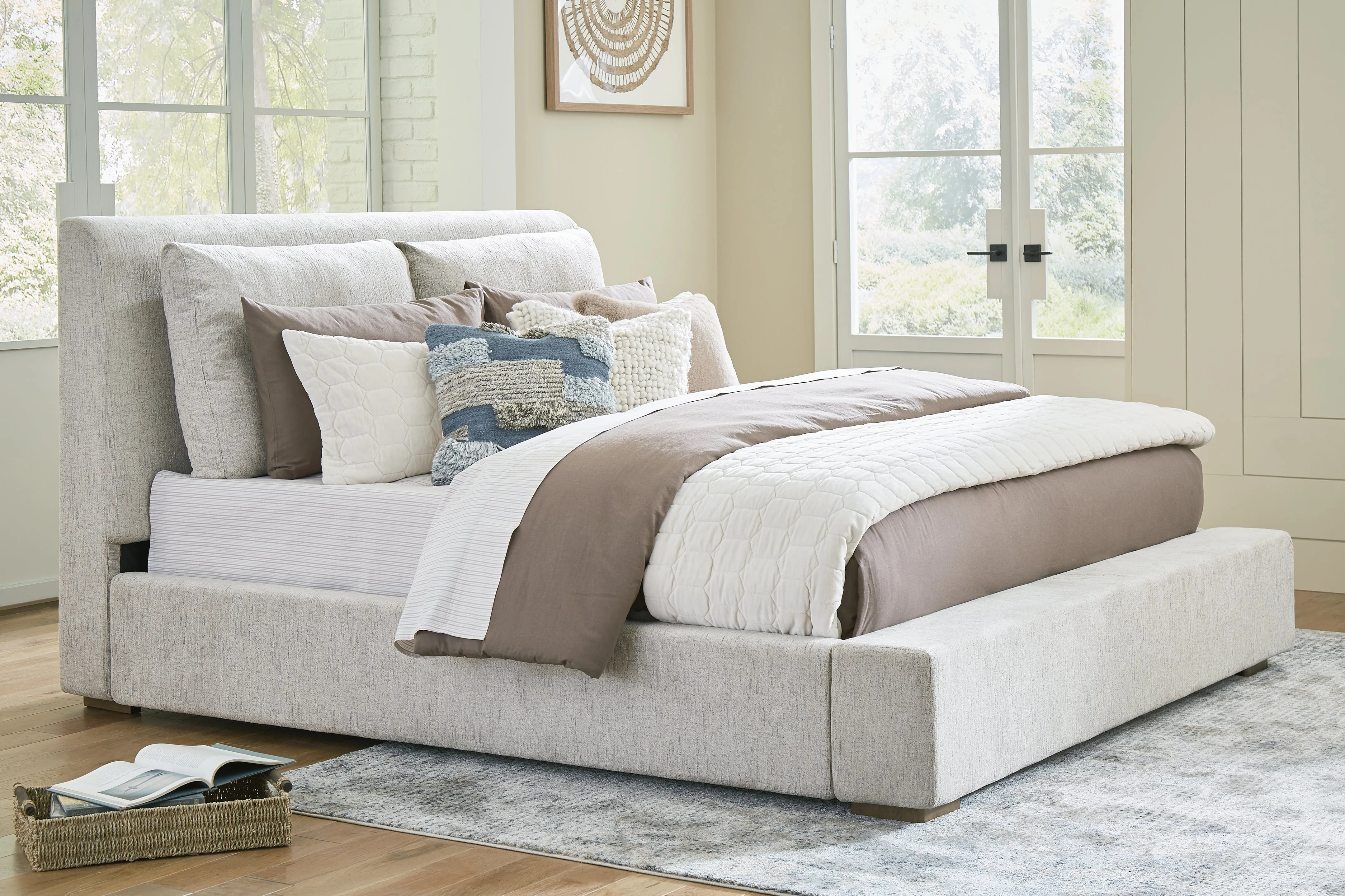 Cabalynn King Upholstered Bed with Mirrored Dresser and Chest in Light Brown
