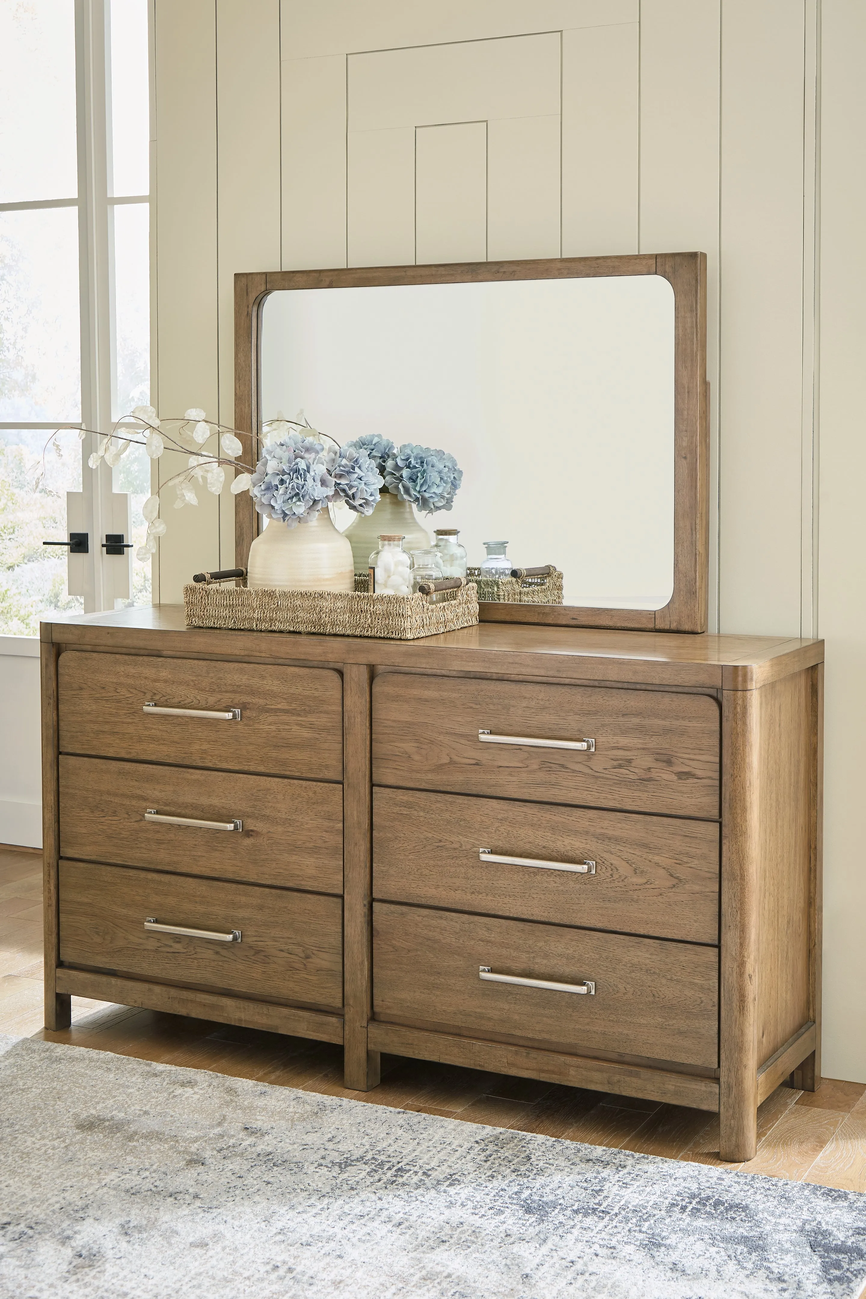 Cabalynn King Upholstered Bed with Mirrored Dresser and Chest in Light Brown