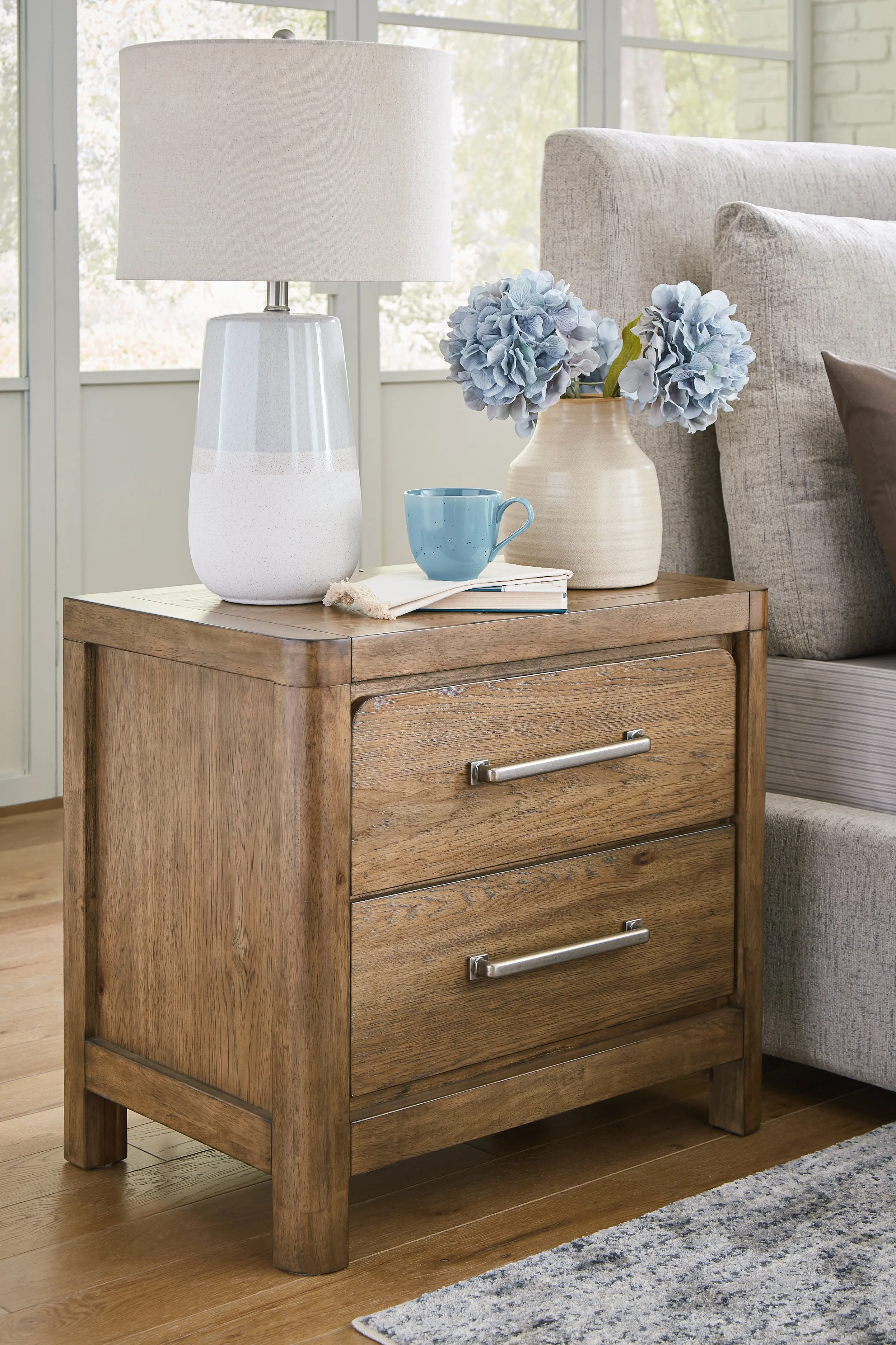 Cabalynn Queen Upholstered Bed with Mirrored Dresser, Chest and 2 Nightstands in Light Brown
