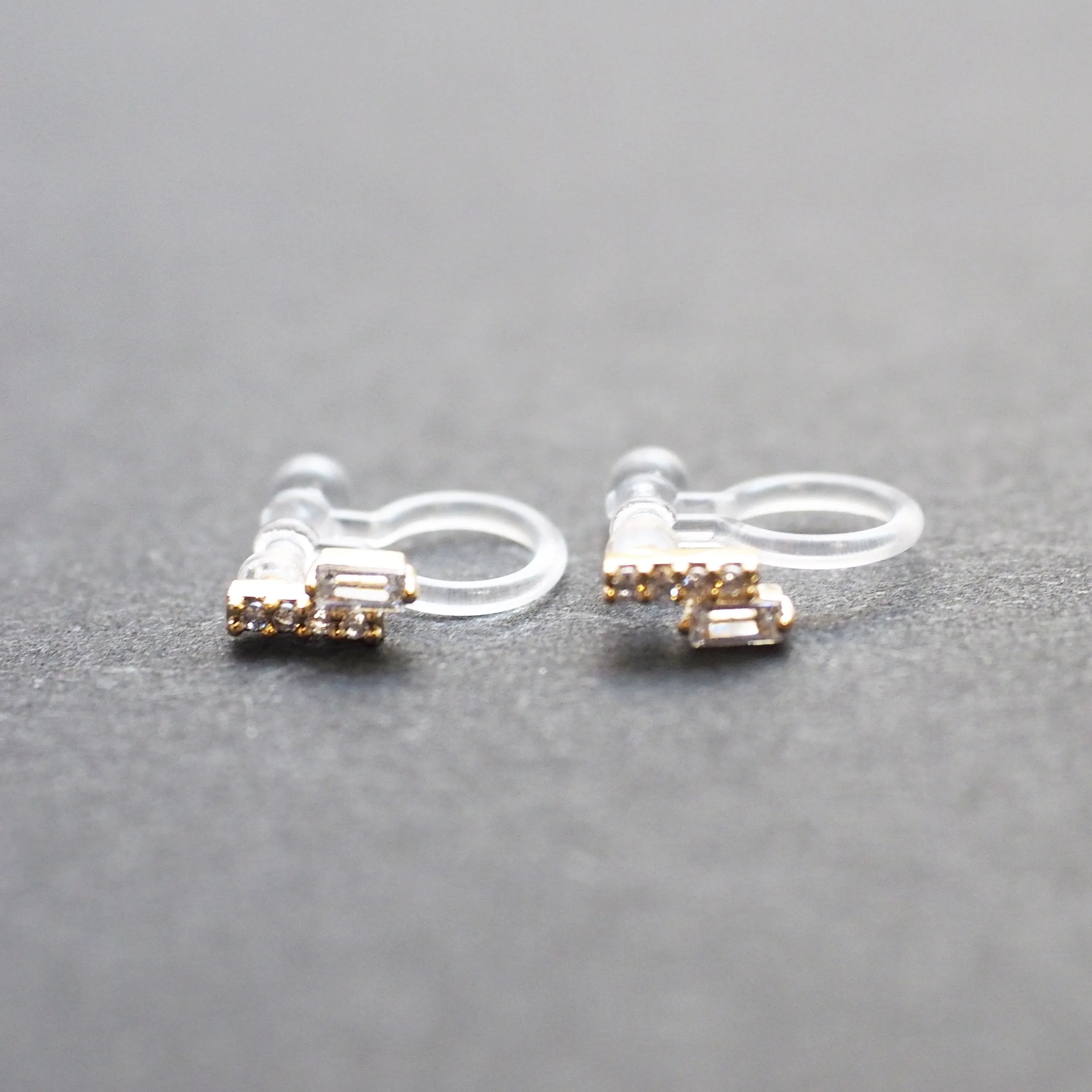 Cubic Zirconia Crystal Bar Invisible Clip On Stud Earrings ( Gold tone )