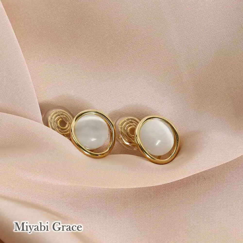 Round Beige Gold Dome Crystal Coil Clip On Earrings