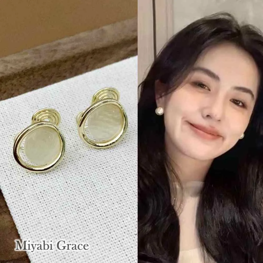 Round Beige Gold Dome Crystal Coil Clip On Earrings